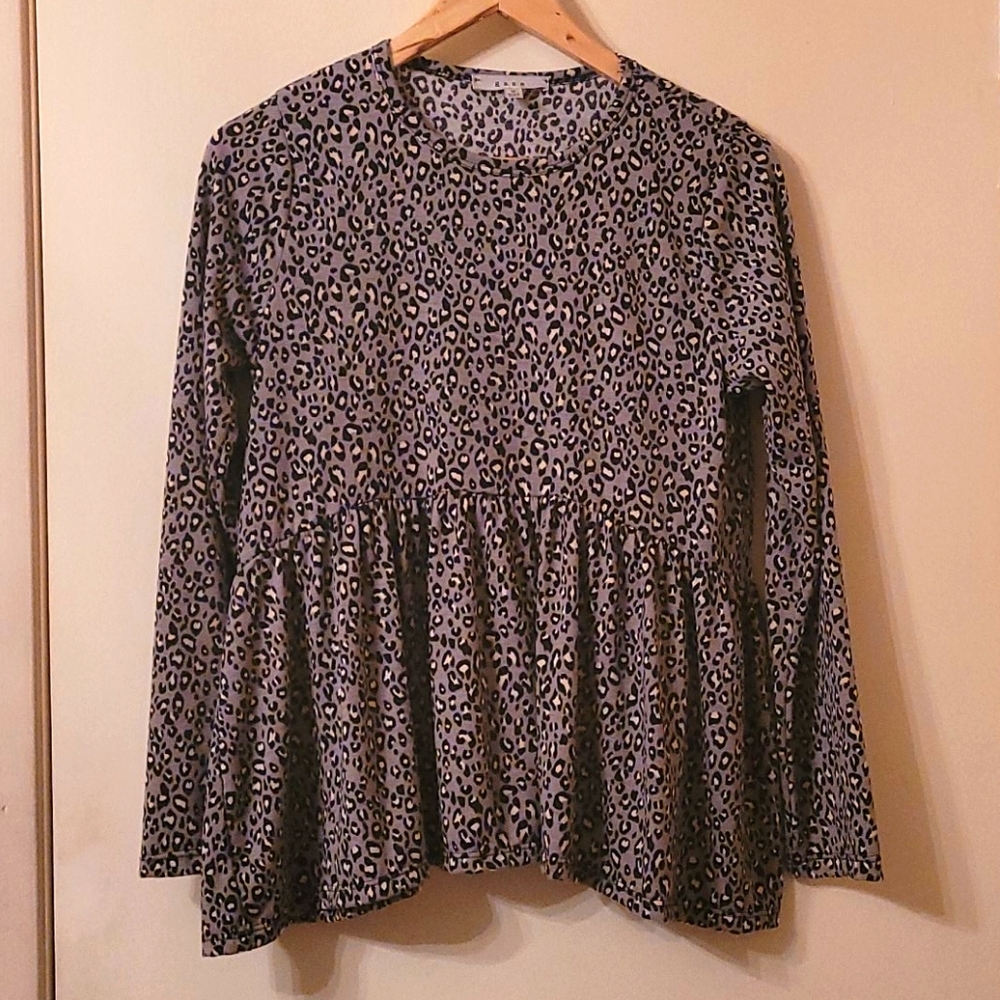 New leopard print long sleeve peplum top.